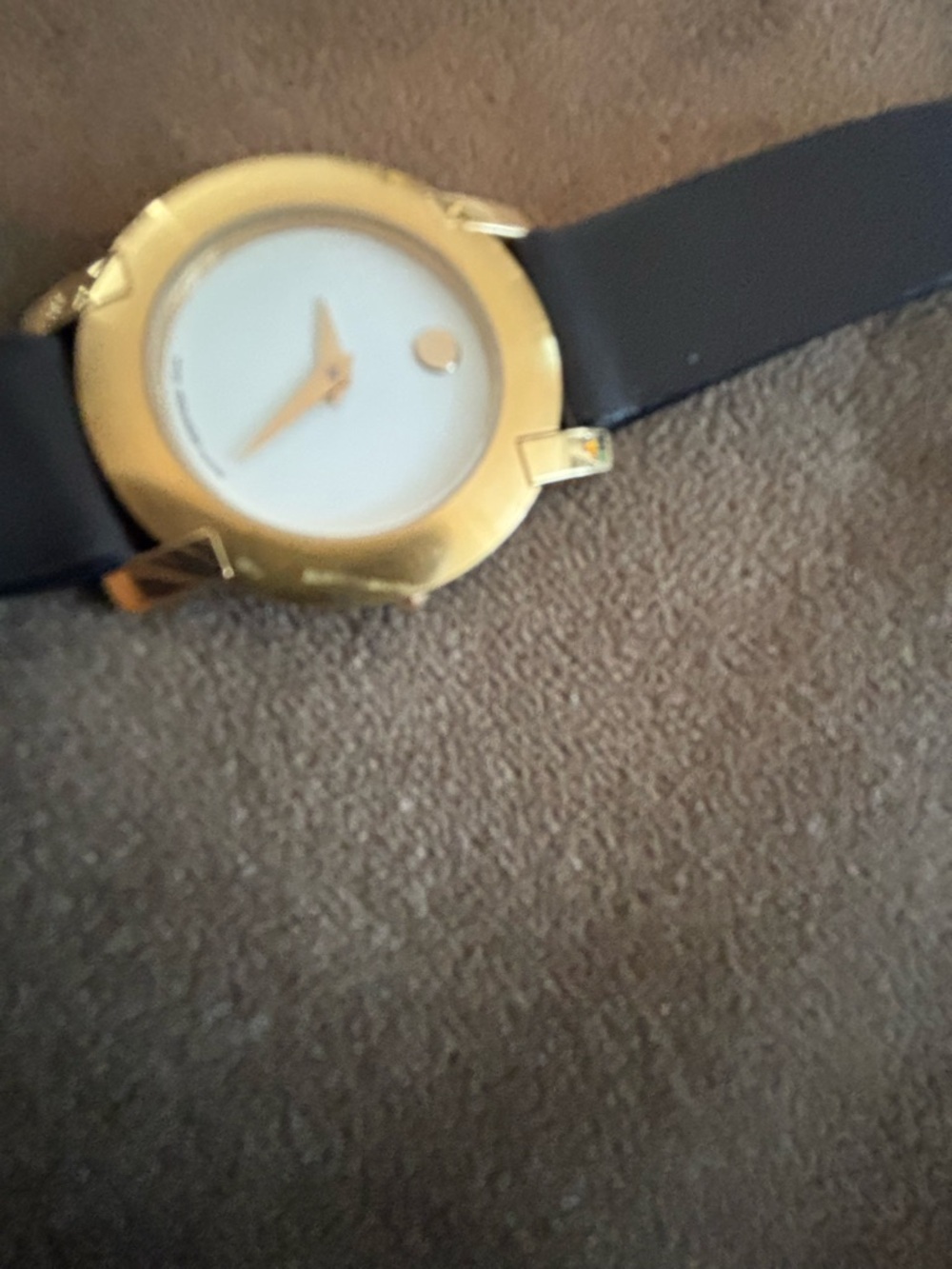 Movado gold tone women’s watch with black leather strap. - Picture 2 of 5